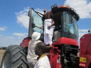 Minister Chimene standing on one of the 500HD tractor while Manicaland provincial administrator Fungal Mbetsa (on ground) looks on